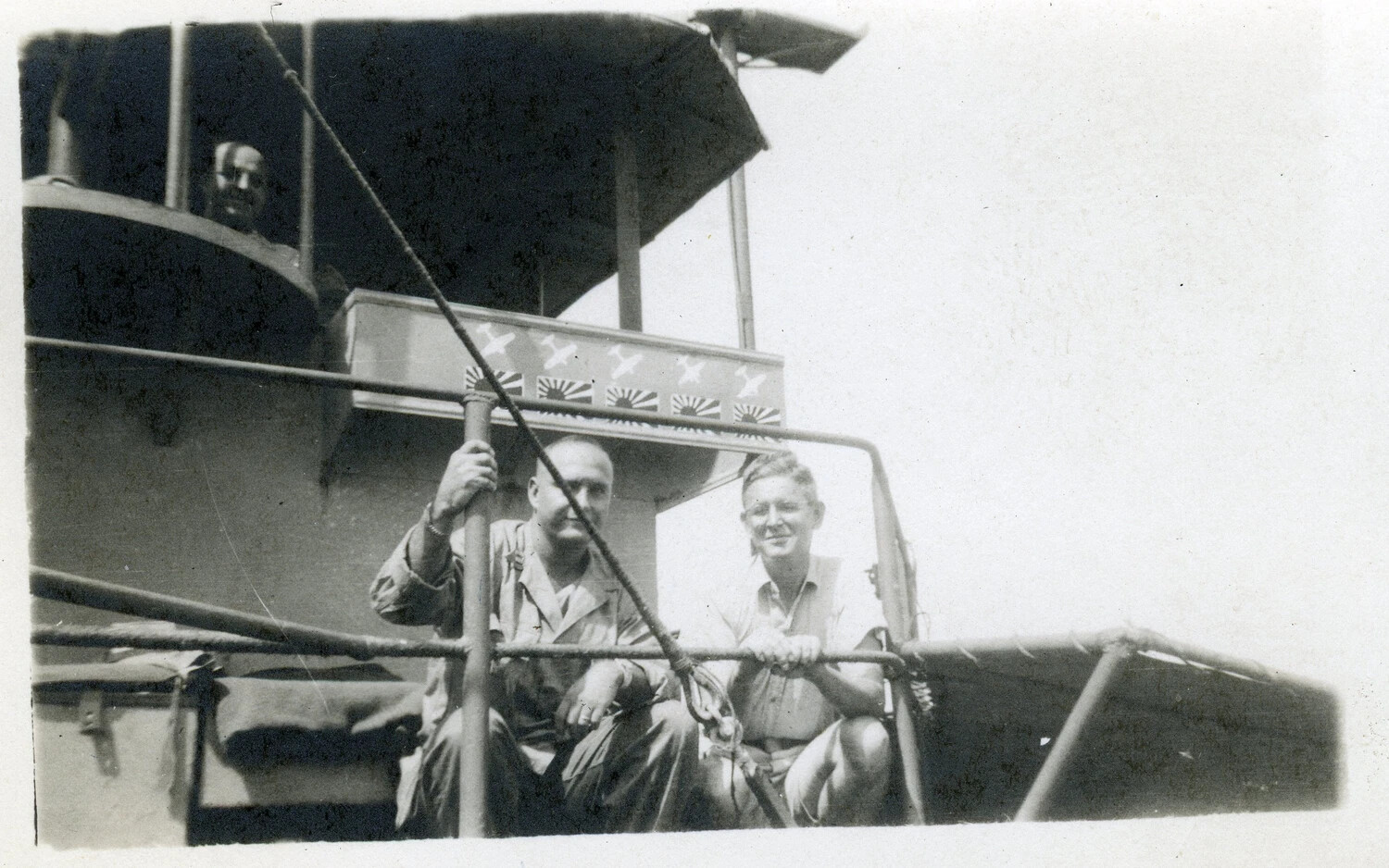 Sailors Beside Aircraft Kill-Tally Markings on Ship's Bridge Wing, WWII Pacific
