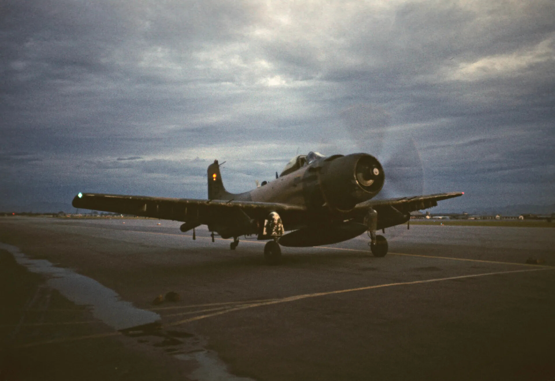 A-1 Skyraider Taxiing at Dusk, Don Engebretsen Slide Collection
