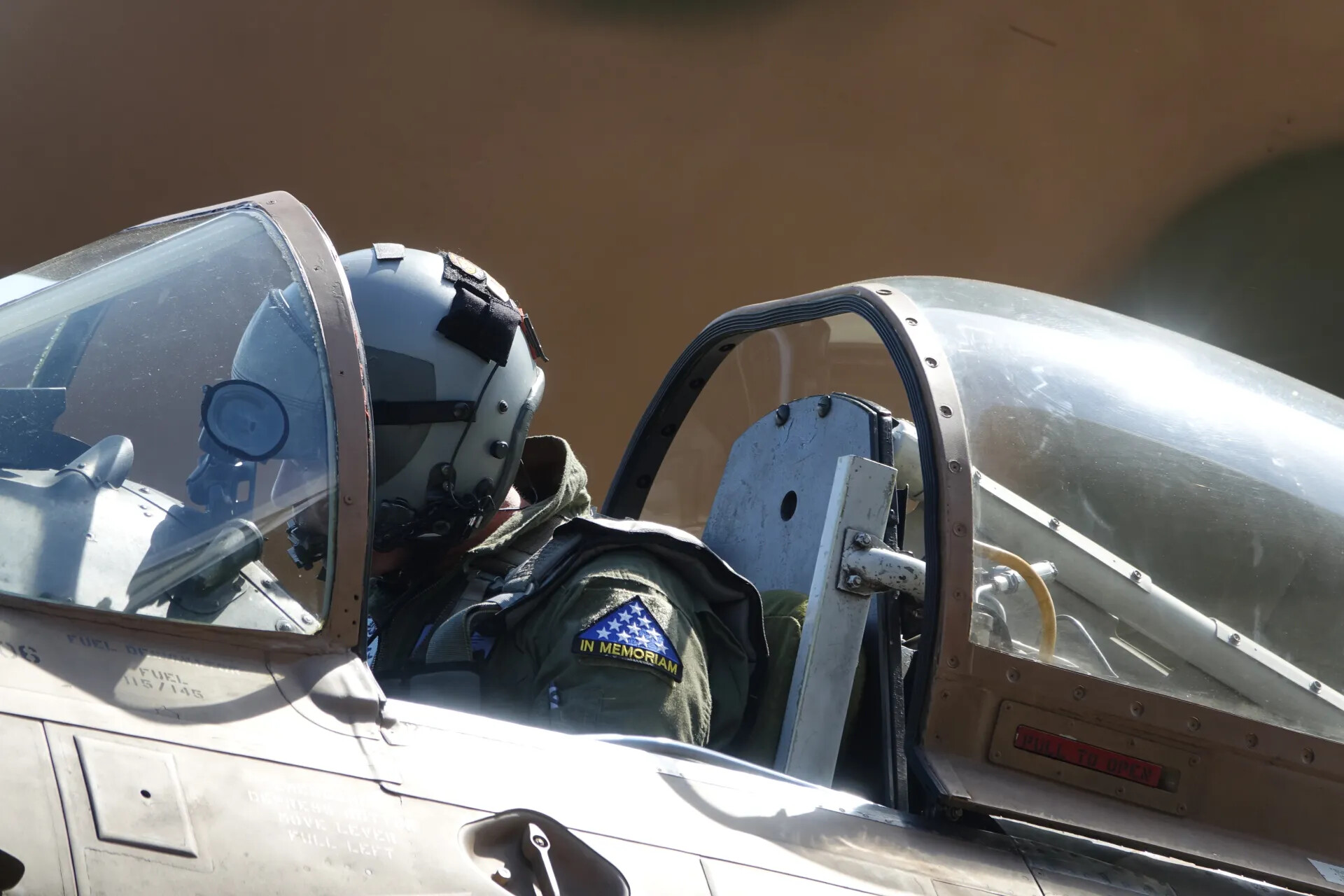 Pilot Seated in the Cockpit of an A-1 Skyraider with Canopy Open, 3-4 May 2019 Event
