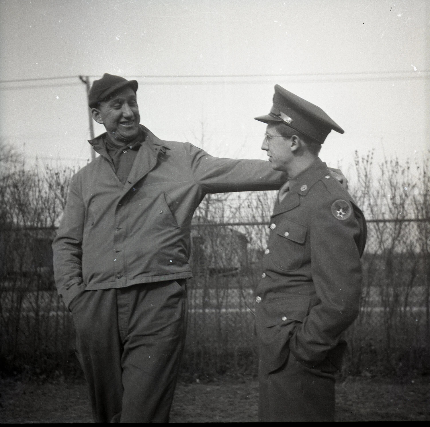 Airman in U.S. Army Air Forces Uniform with Civilian Companion, Outdoor Portrait