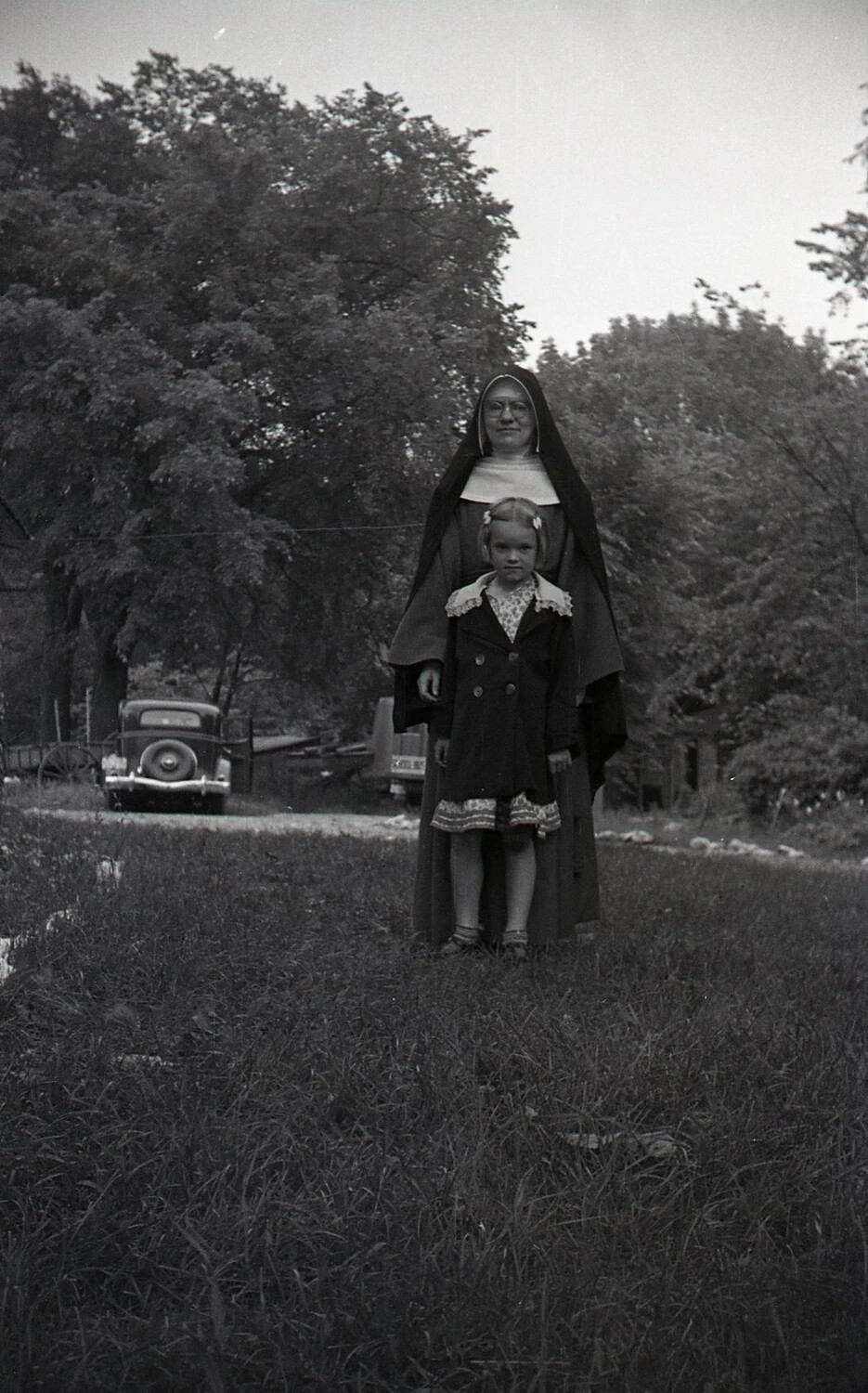 Nun and Young Girl Posed Roadside, Stateside Negative