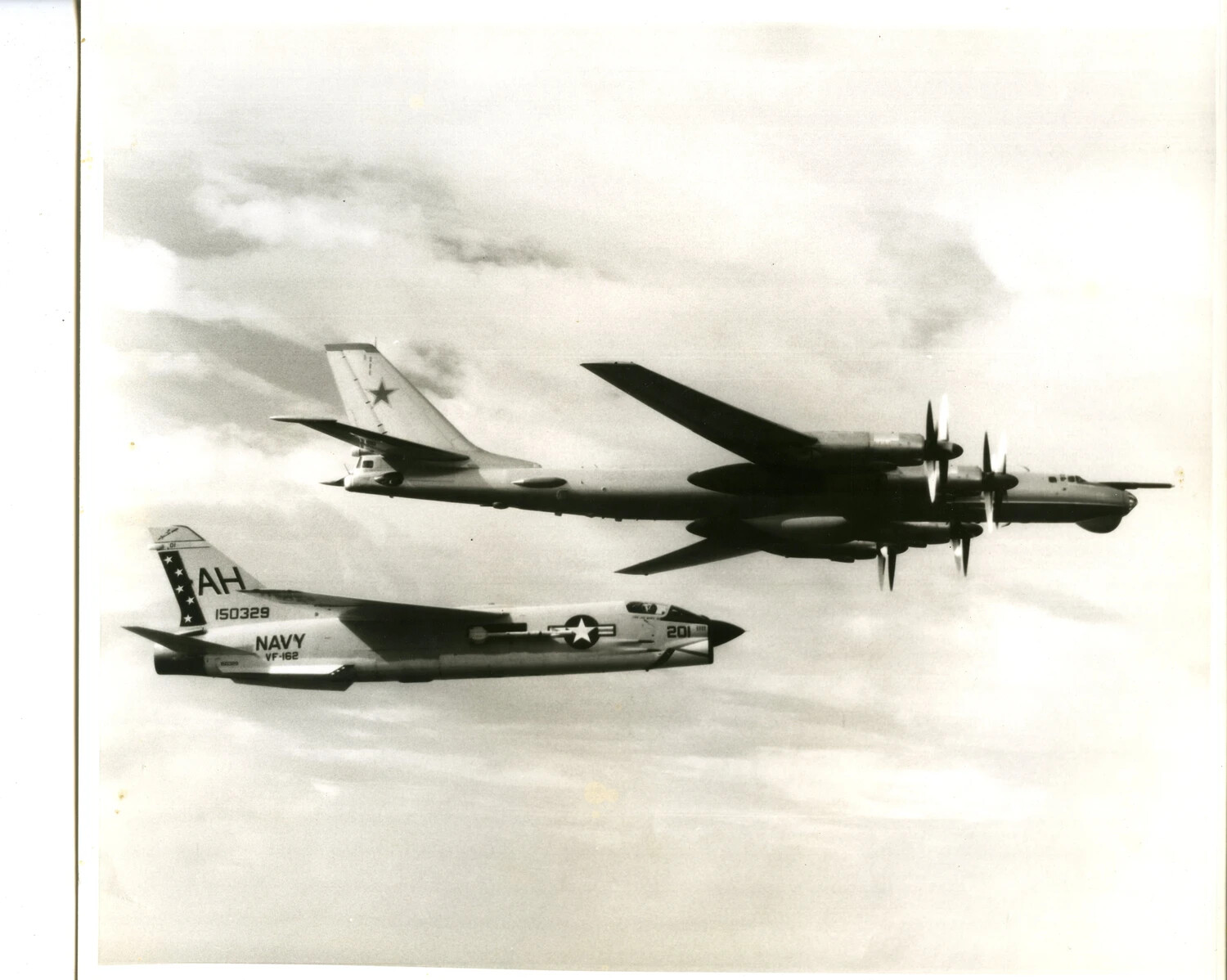 U.S. Navy F-8 Crusader (VF-162) Intercepts Soviet Tu-95 'Bear' Bomber, Vietnam War Era