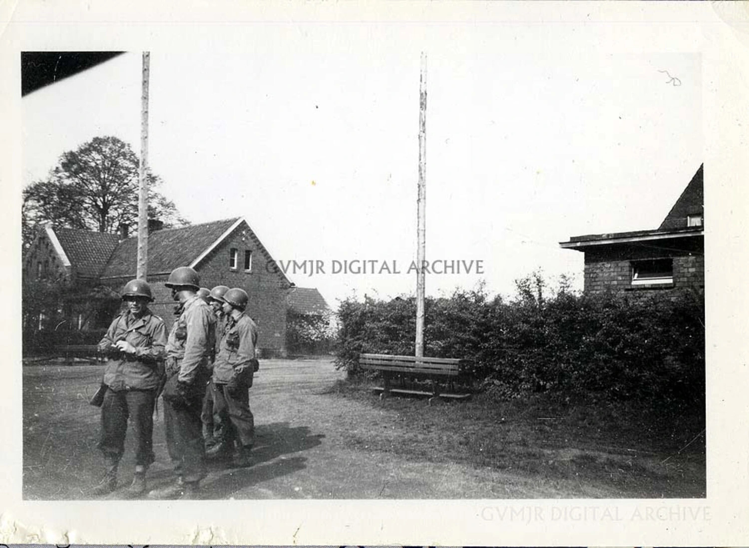 American Paratroopers Gathered Outside a Requisitioned European Farmhouse, WWII