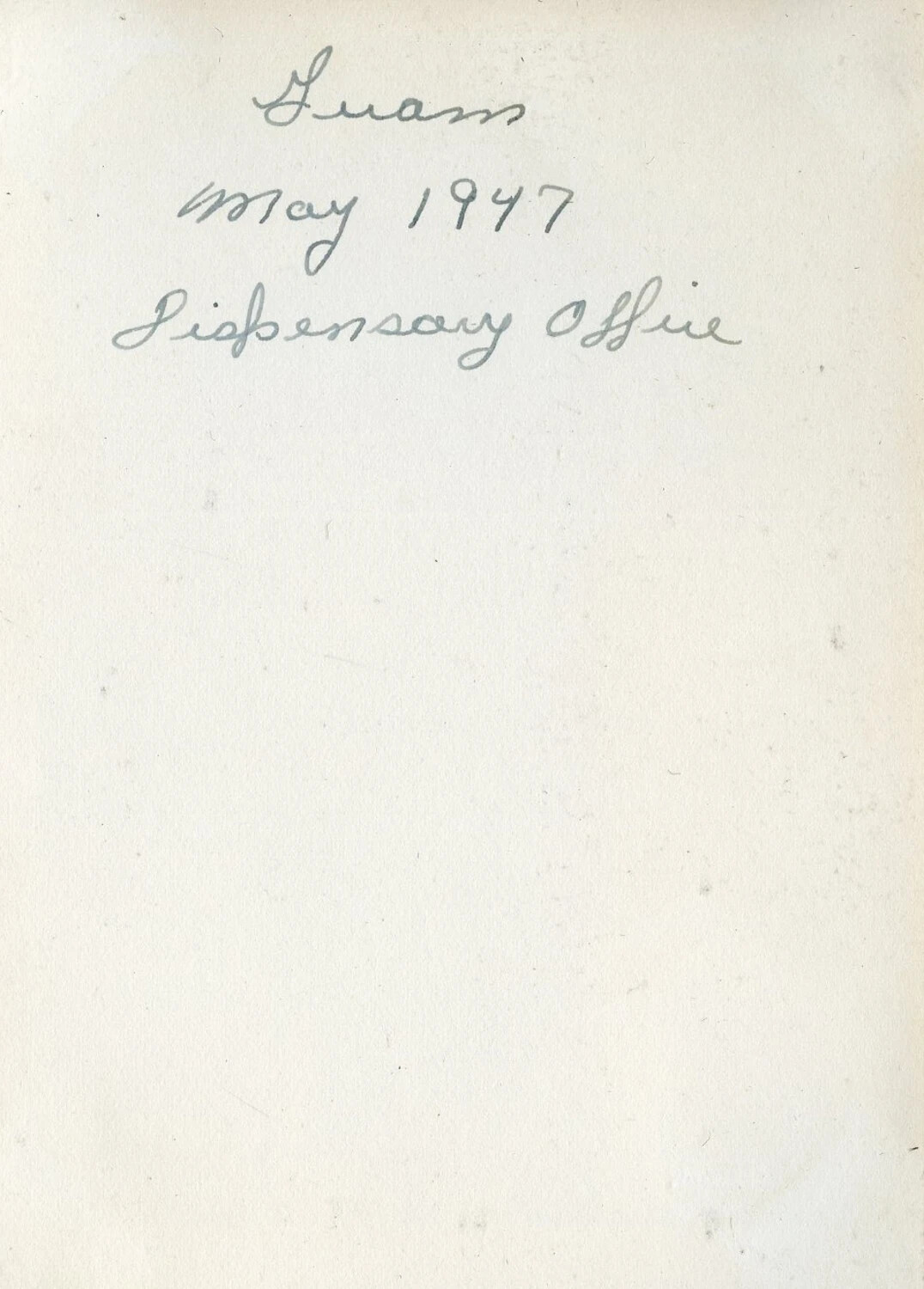 Handwritten Album Caption Page: 'Guam, May 1947, Dispensary Office'