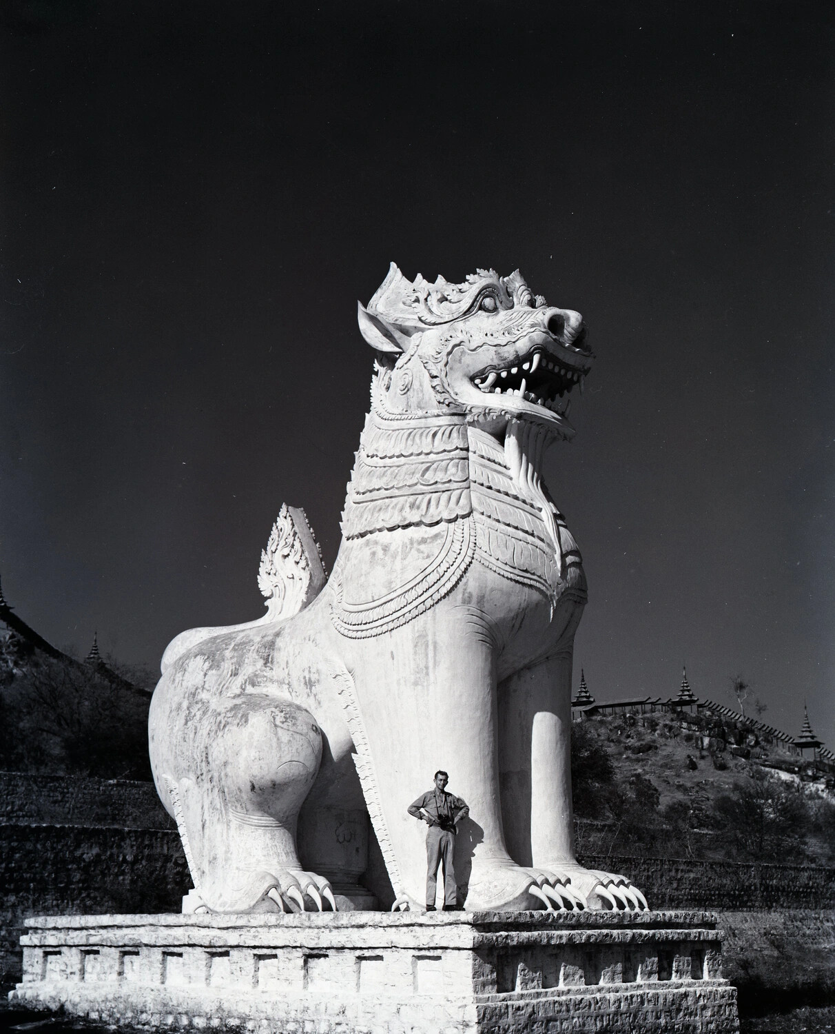 American Serviceman Beside a Monumental Chinthe Statue Near Mandalay, Burma