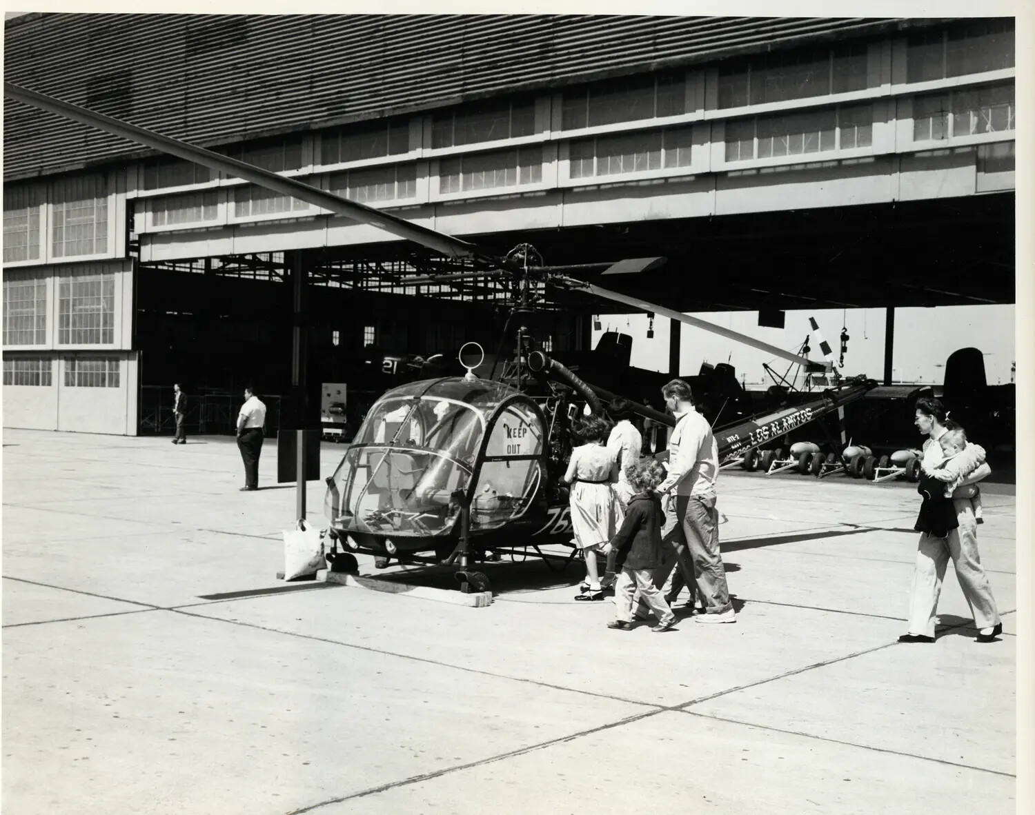 Family Visits Light Observation Helicopter During Open House, Naval Air Station Los Alamitos, California
