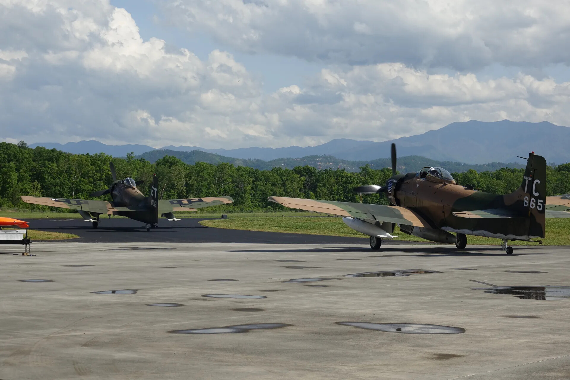 Two A-1 Skyraiders on Ramp, Tail Codes TC-665 and ET-606, May 2019 Gathering