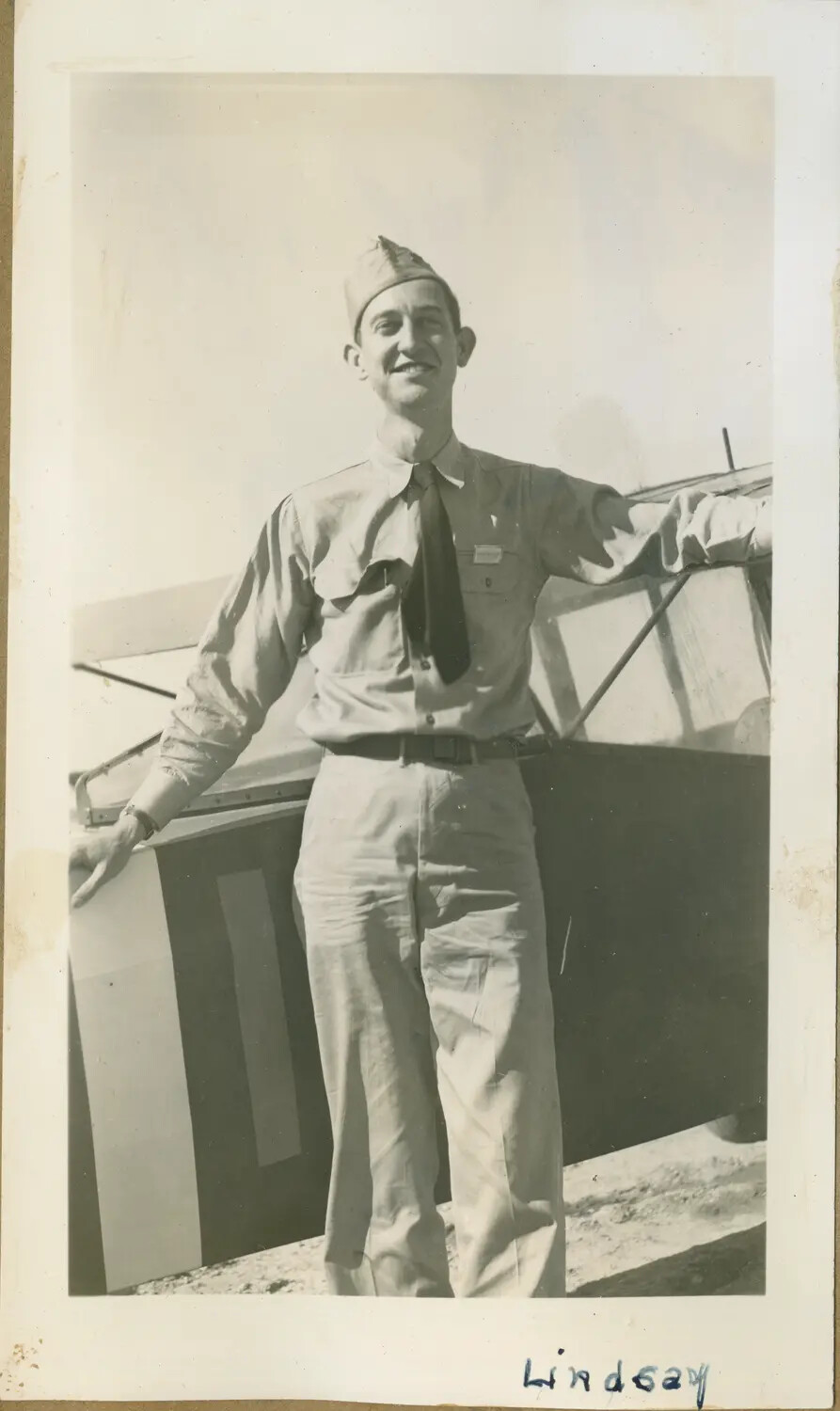 Aviation Cadet 'Lindsay' Beside a Light Training Airplane, V-5 Program Era