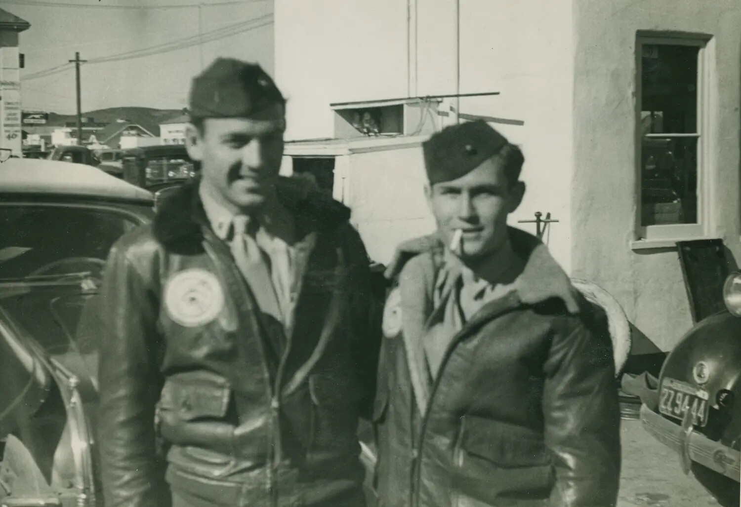 Two Aviators in A-2 Flight Jackets Beside Parked Automobiles, Edward P. McAleer Collection, WWII Era