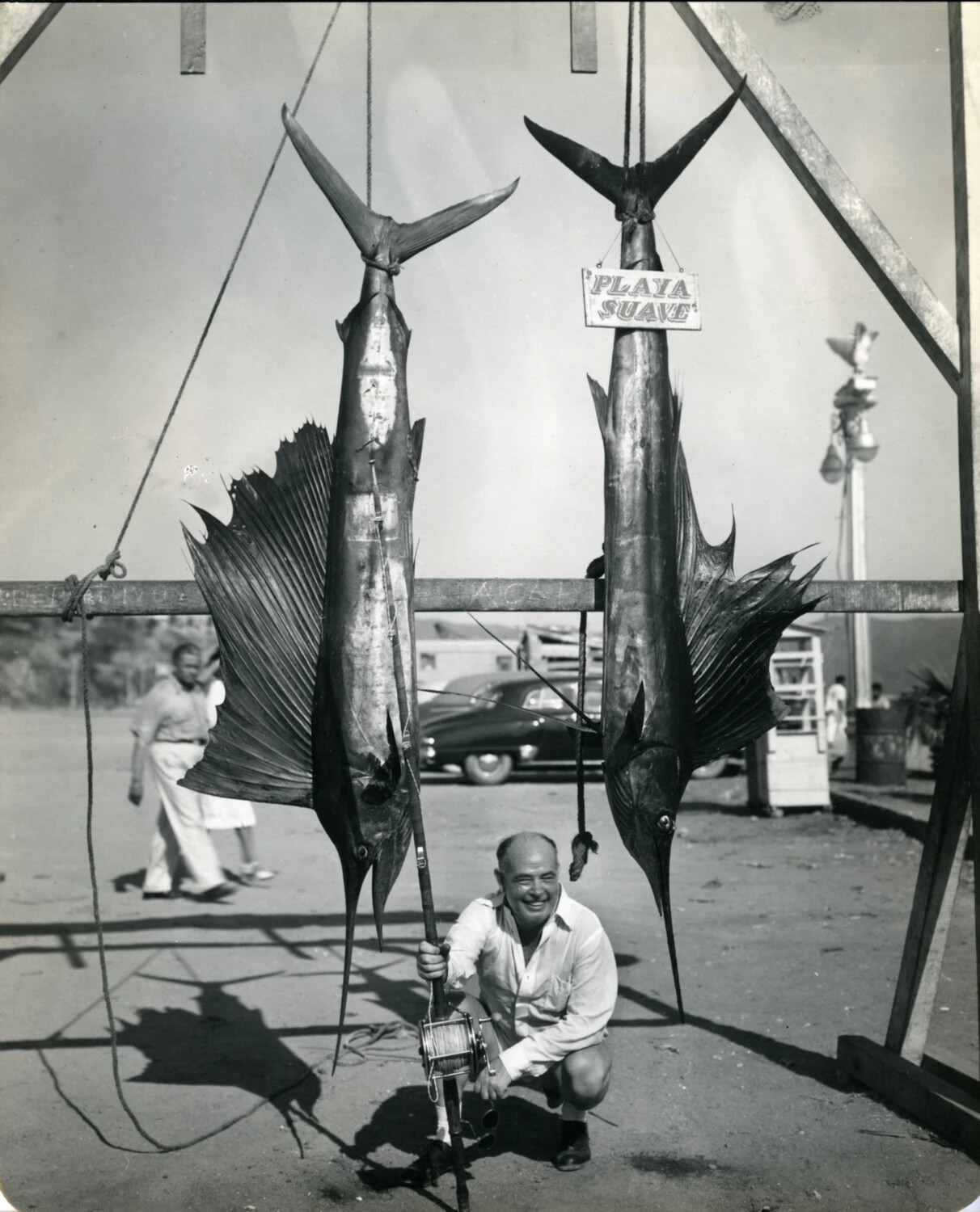 Angler Posing with Trophy Sailfish Catch at 'Playa Suave,' Acapulco, Mexico, 1949