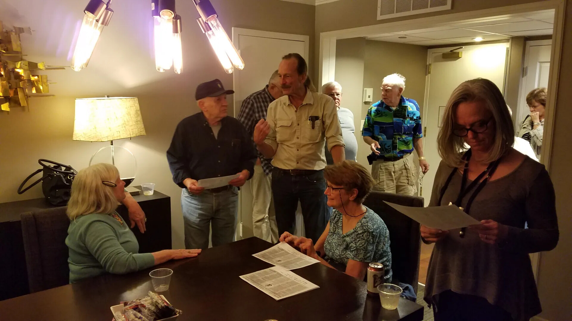 Informal Gathering in Hotel Suite with Printed Materials, October 21, 2017