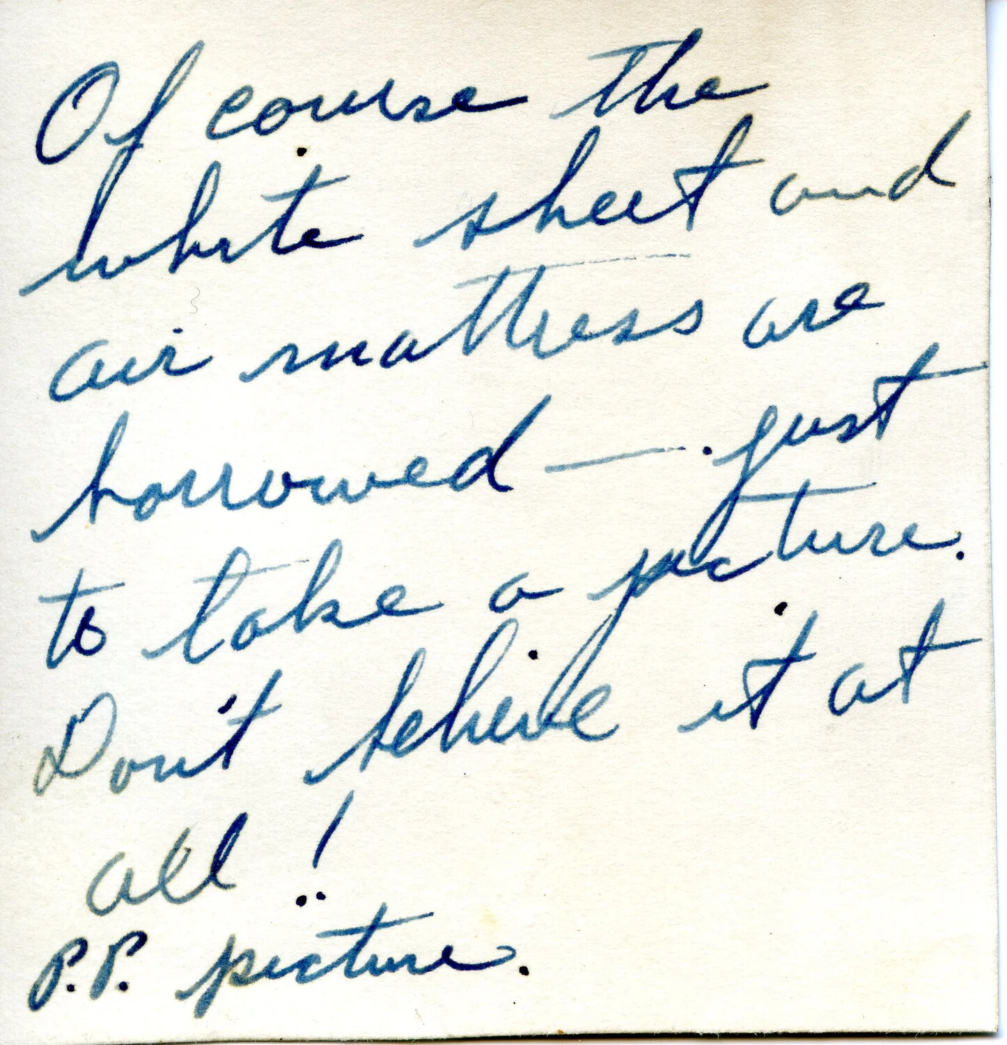 Verso of Photograph with Handwritten Humorous Annotation — 'Of course the white sheet and air mattress are borrowed...' WWII Photo Album