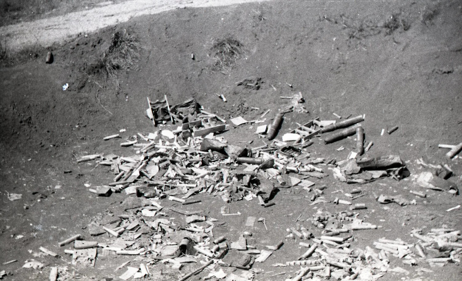 Discarded Ordnance and Ammunition Debris at a Battlefield Site, Luzon, Philippines, WWII