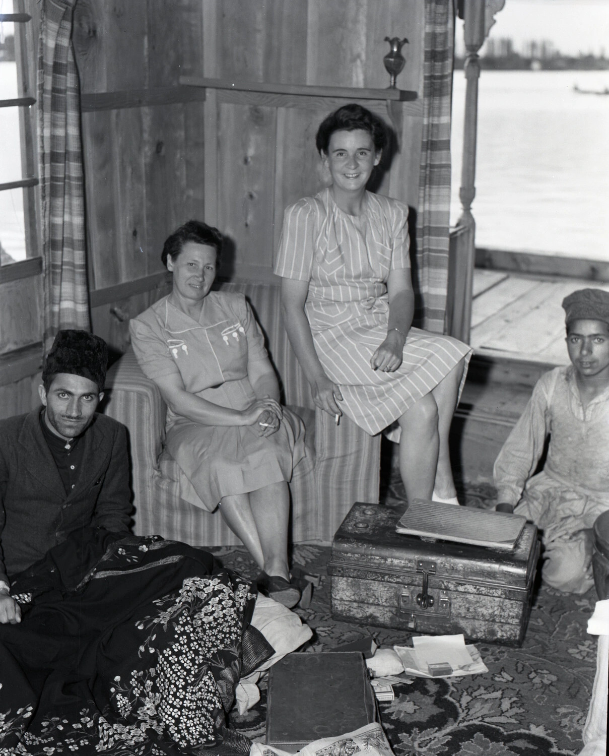 Western Women and Kashmiri Attendants Aboard a Houseboat, Kashmir, WWII CBI Collection