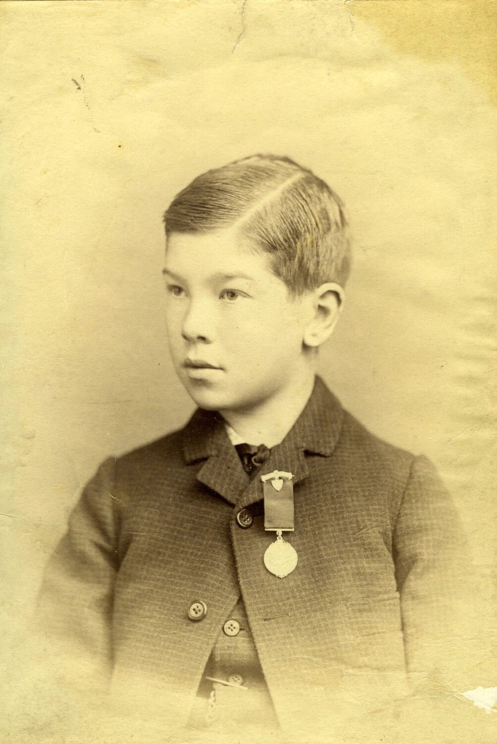 Studio Portrait of a Boy, Age Twelve, Wearing a Medal -- Believed to be Carl Stone, Late 19th Century