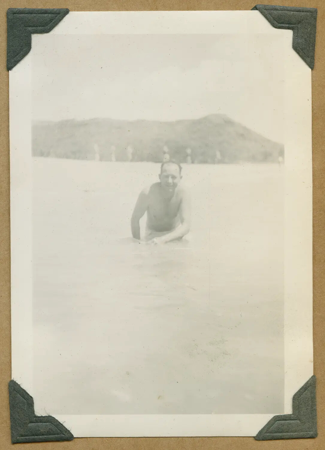 Off-Duty Serviceman Wading in the Surf, Hawaii, World War II Era