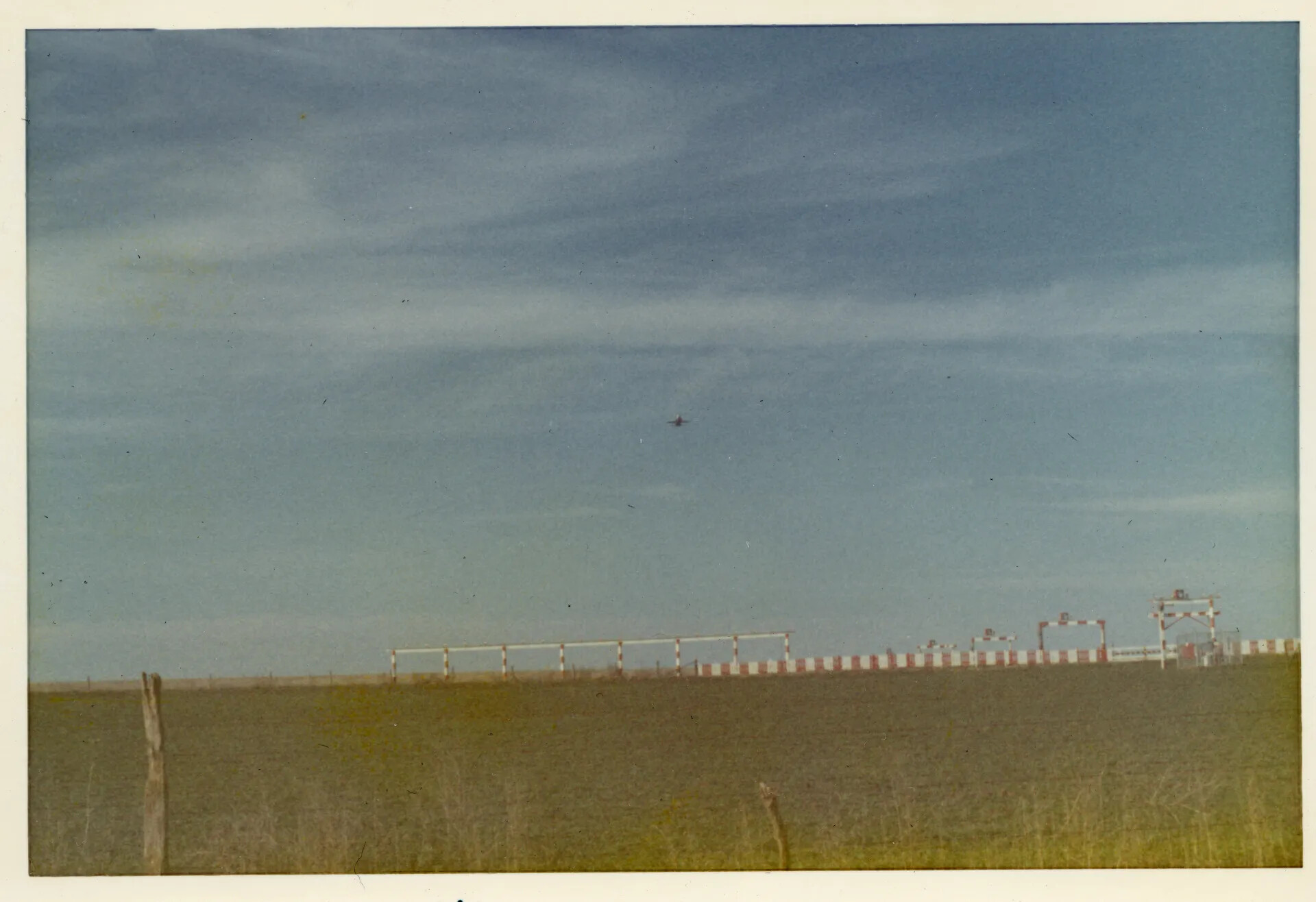 Aircraft on Approach Over Runway Approach Lighting System, USAF Training Base