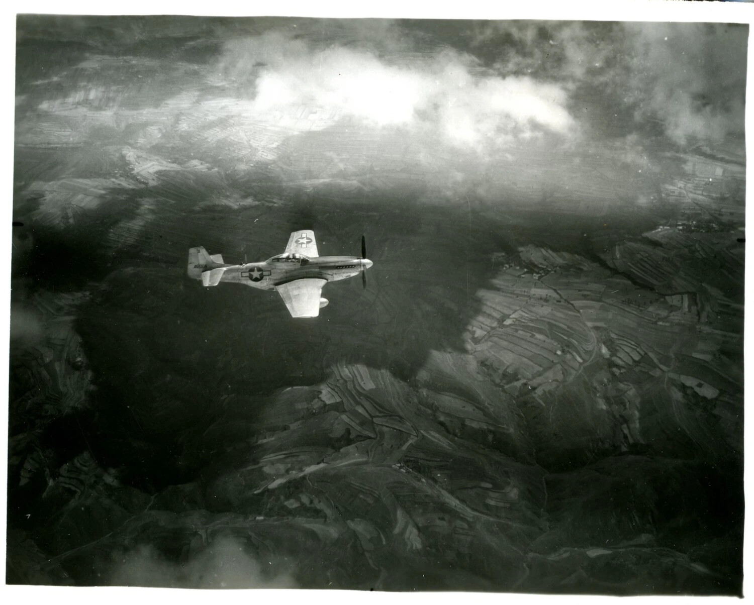 P-51 Mustang Fighter in Flight Over Mountainous Terrain, CBI Theater, World War II