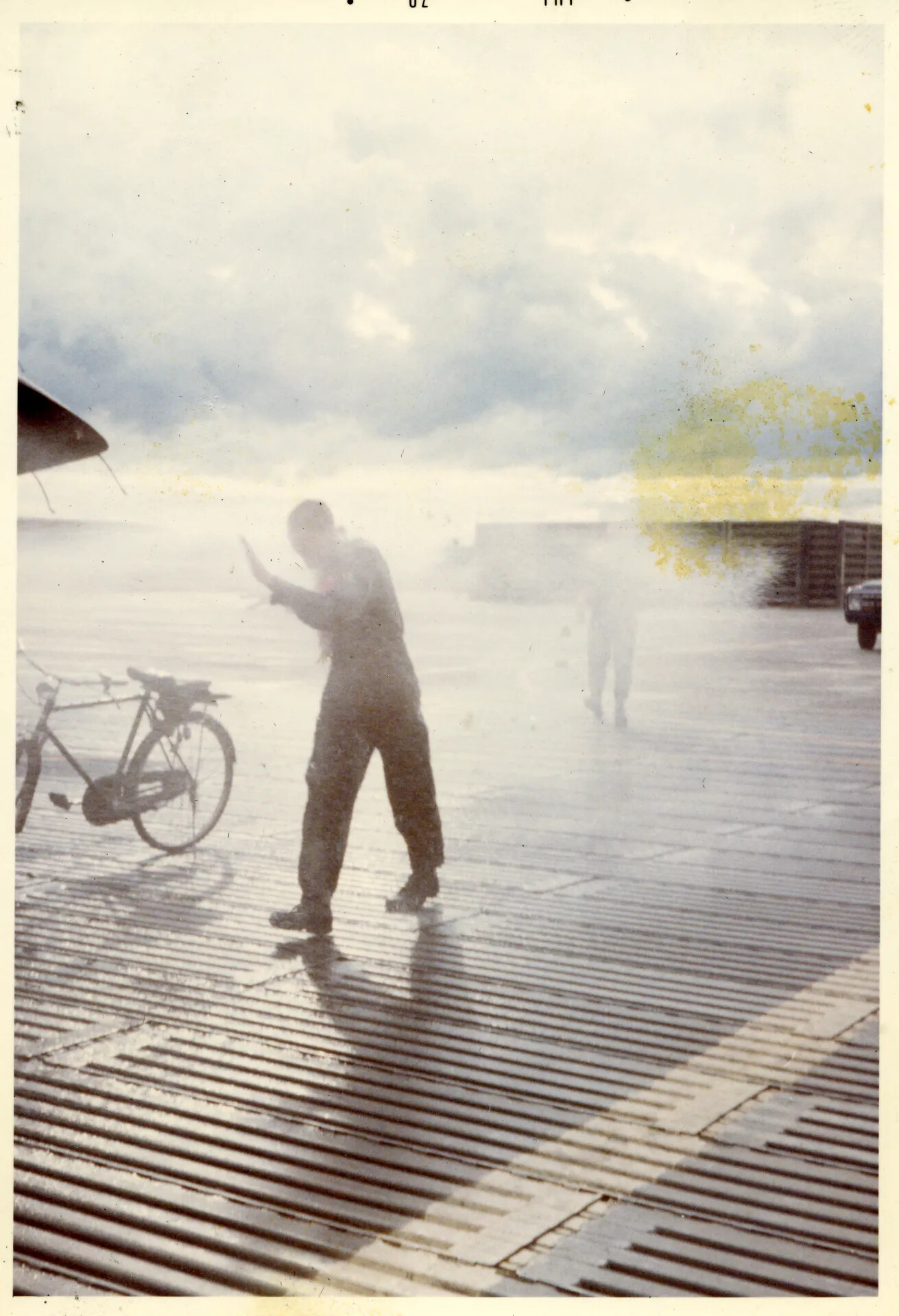 Airman Walking Through Fog or Smoke on Flight Line, NKP, Vietnam War Era