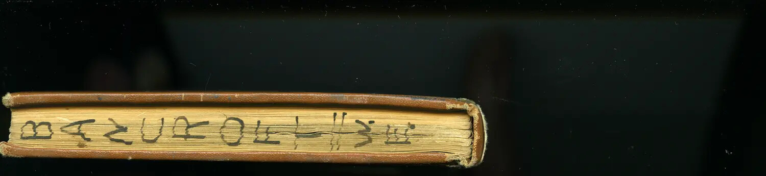 Fore-Edge Detail of a Bound Log Book, Likely Lt. Bancroft's Korean War-Era Flight Log