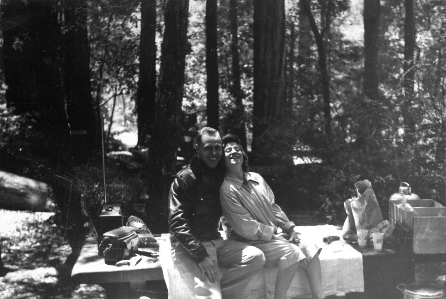 Serviceman in Flight Jacket with Companion at a Redwood Forest Picnic, Korean War Era