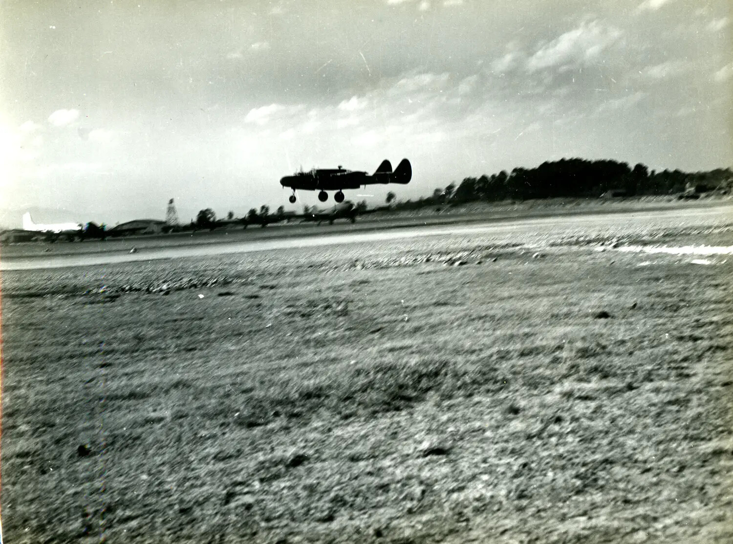 Twin-Engine Bomber Landing at CBI Theater Airfield, World War II Burma