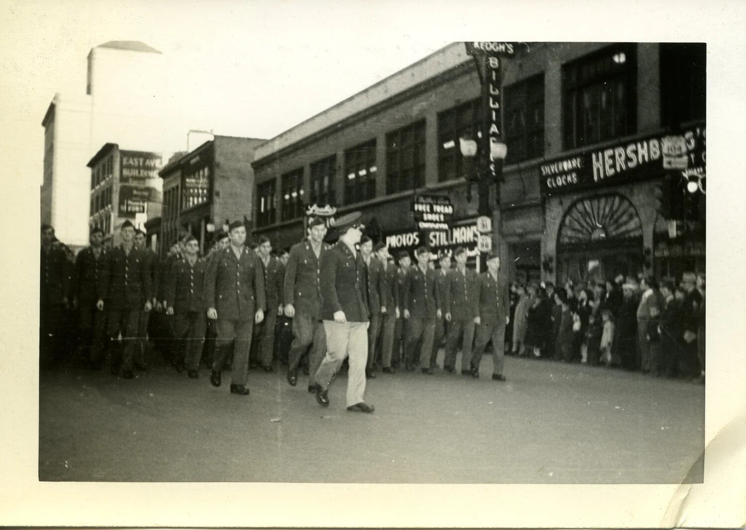 Military Parade Marching Through Downtown American City Street, WWII Era