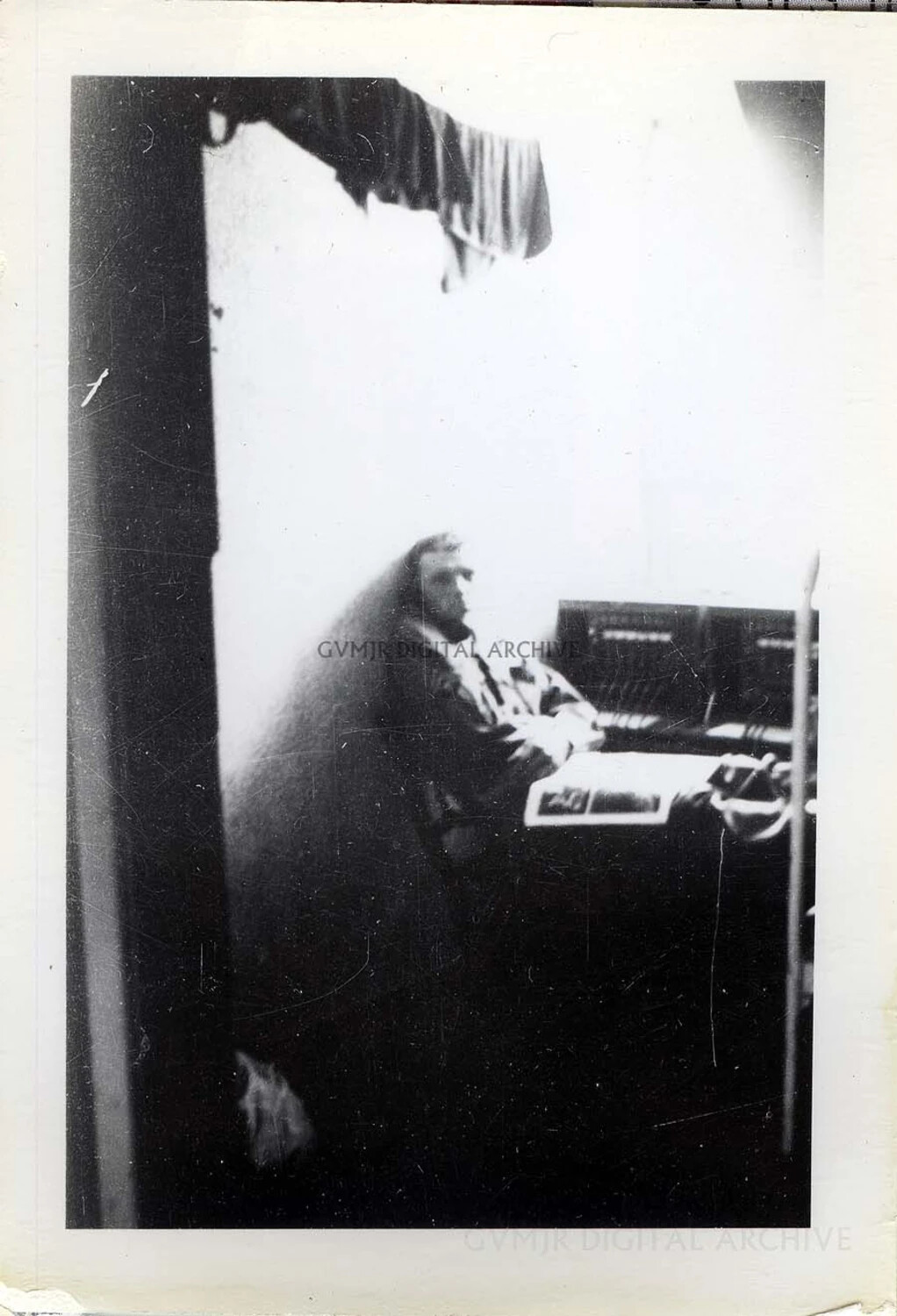 101st Airborne Division Serviceman at Field Equipment Console (Low-Light Interior View)