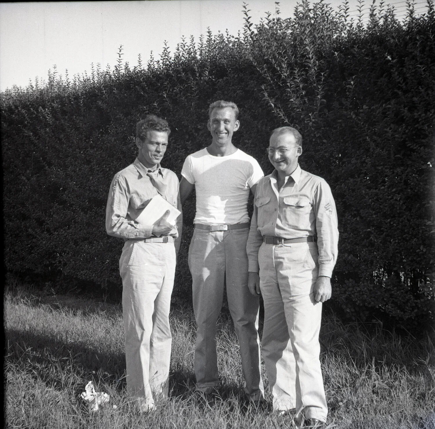 Tennis Champion Bill Tilden with Military Servicemen at a U.S. Army Installation (WWII Era)
