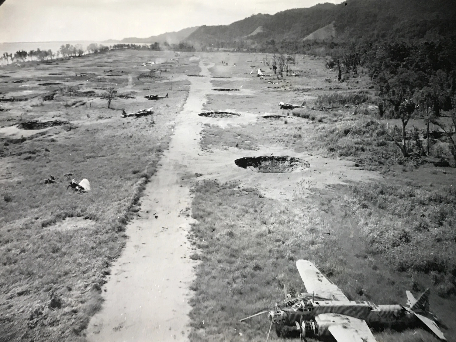 Destroyed Japanese Aircraft on Bombed Airfield, Wewak Area, New Guinea