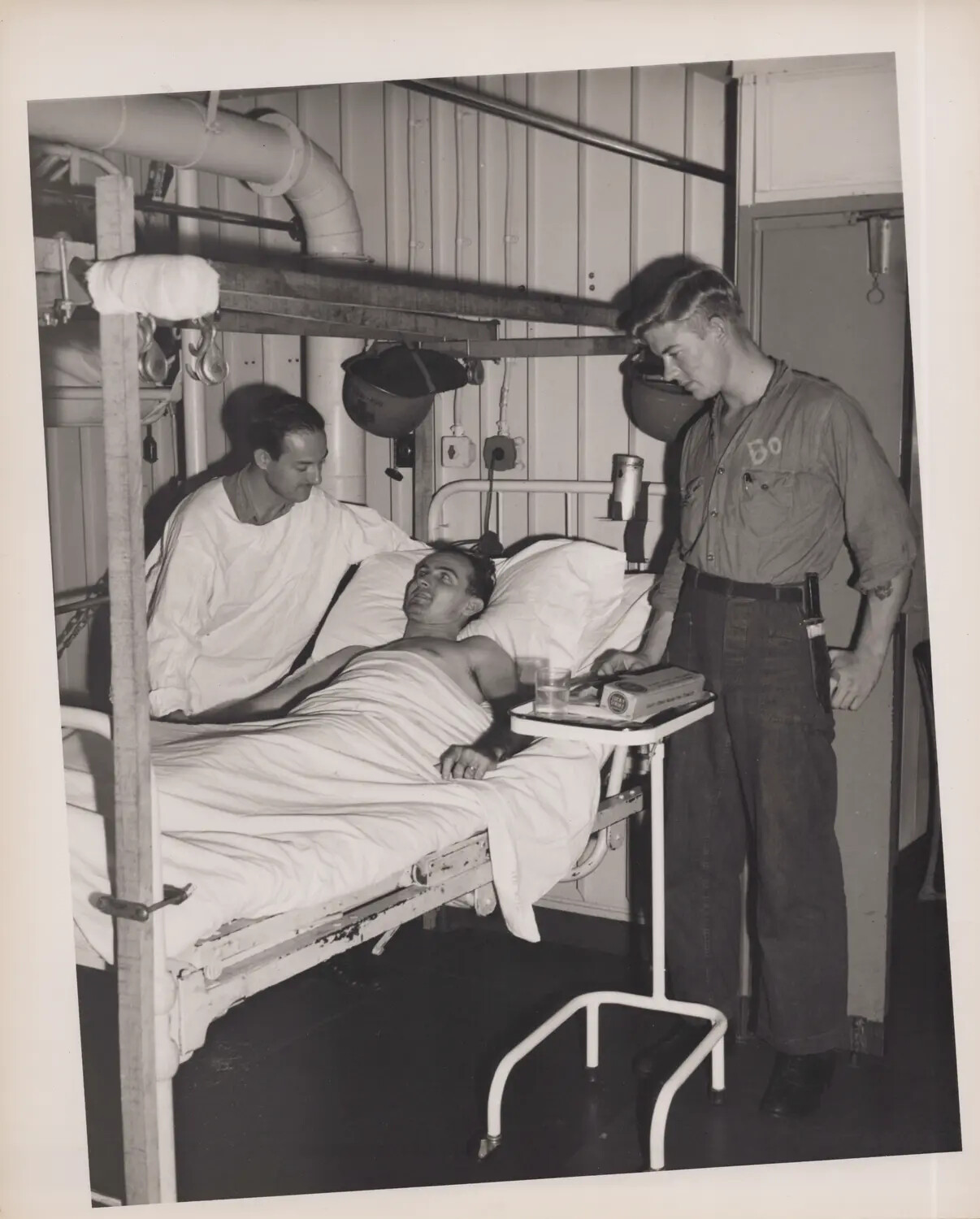 Sailor Recovering in Ship's Sick Bay with Orthopedic Traction Frame, WWII