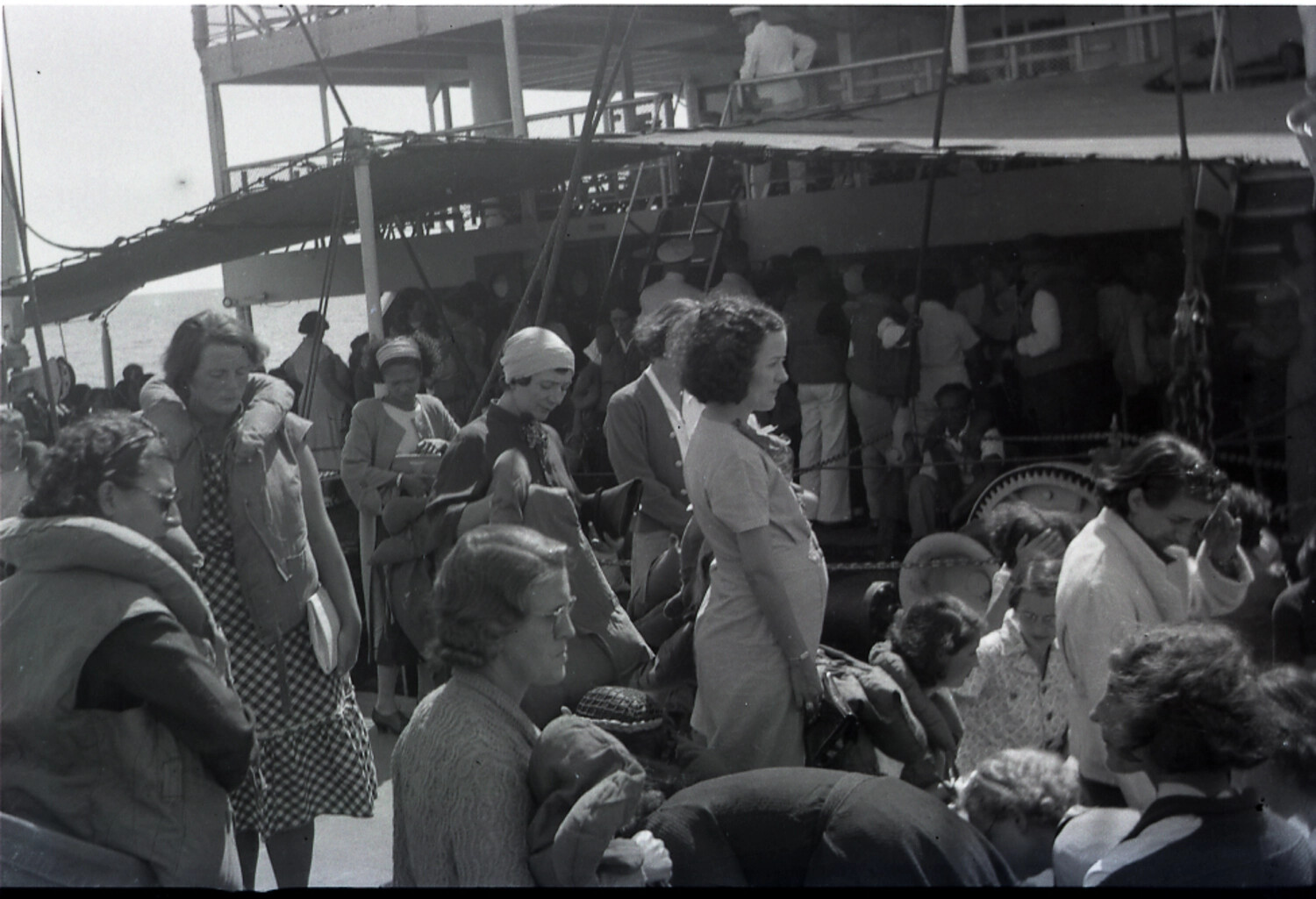 Women and Children in Life Preservers on Ship's Deck, China Evacuation