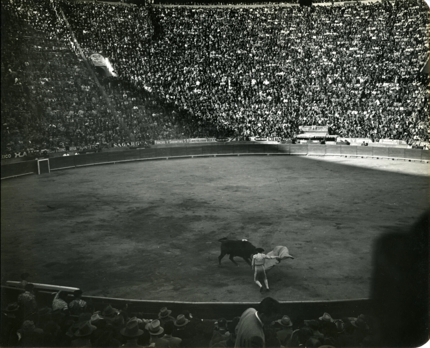 Wide View of Matador and Bull in the Ring, Mexico City Bullring, 1949