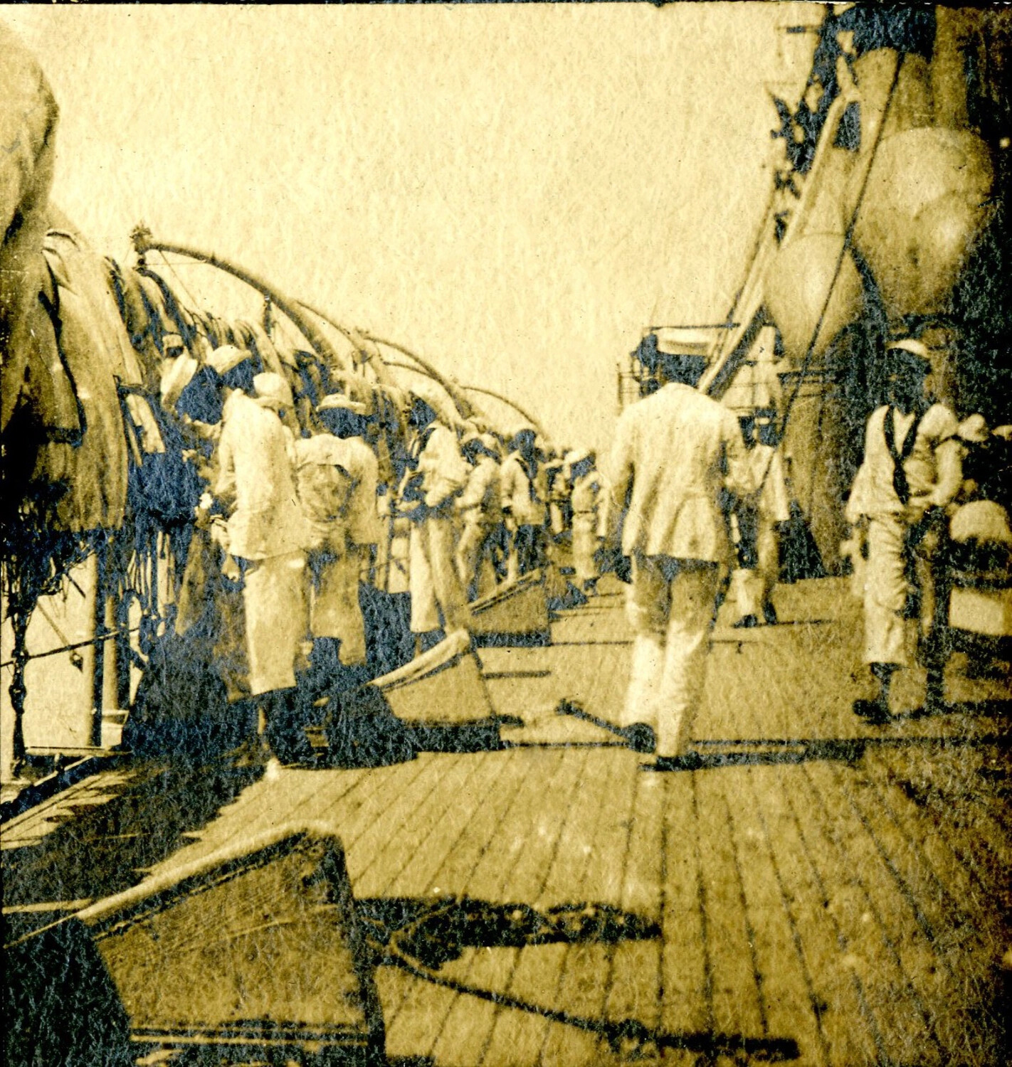 Sailors Working Along the Rail, Boat Deck of a U.S. Navy Protected Cruiser, c. 1898-1910