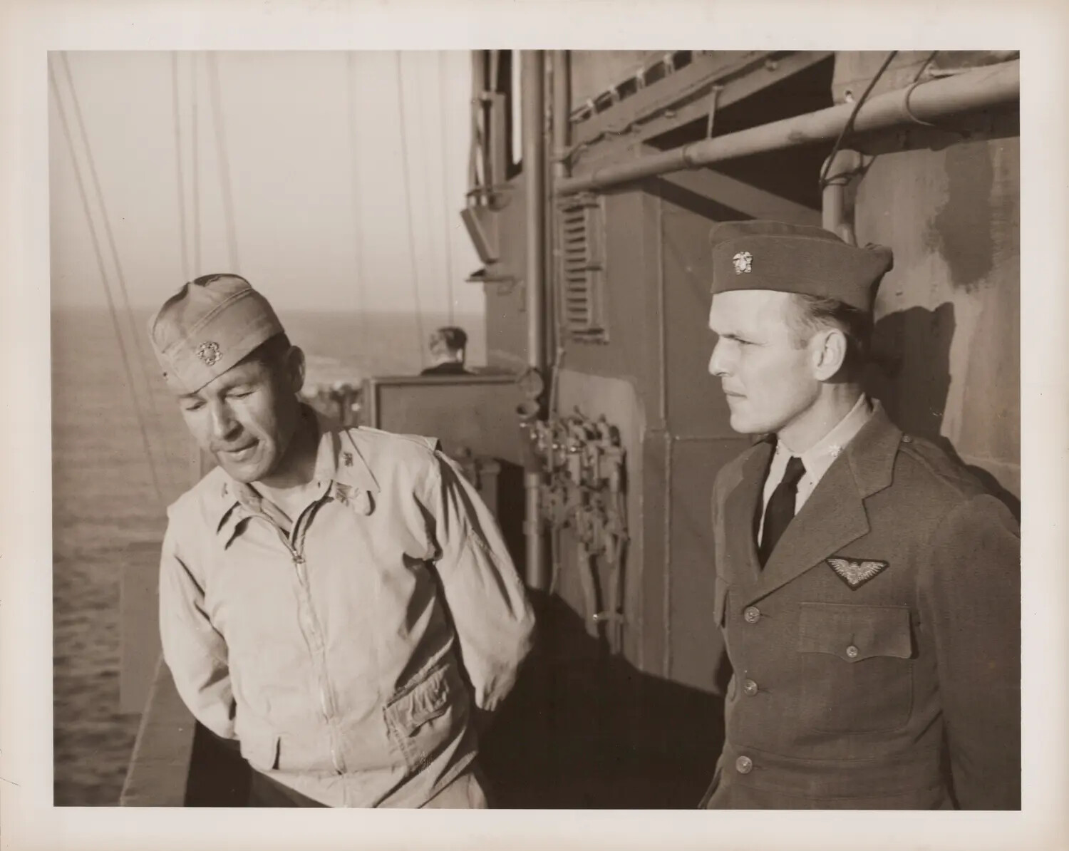 Two U.S. Navy Airmen on Deck, Escort Carrier, WWII