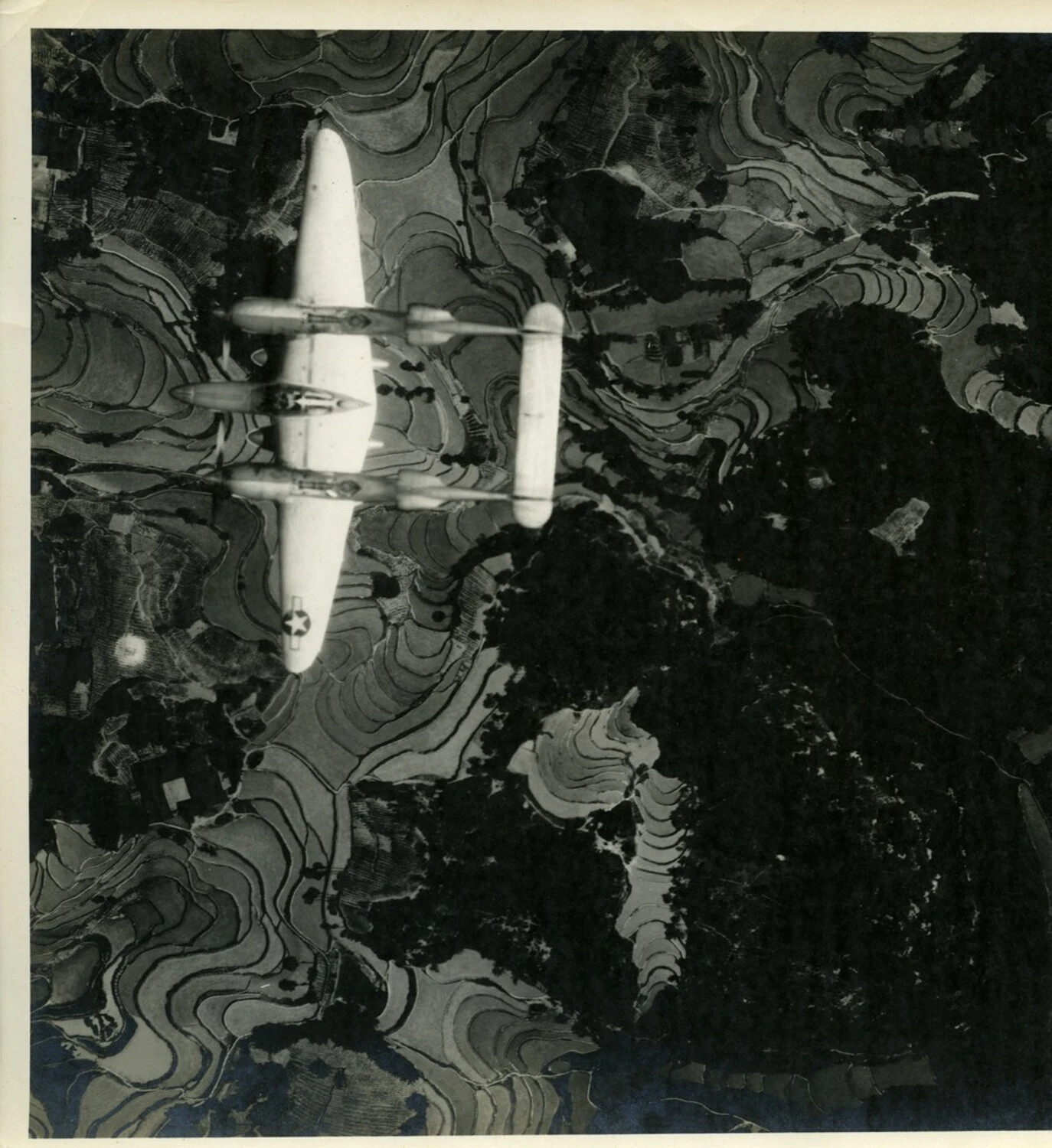 Lockheed P-38 Lightning Banking Over Terraced Terrain, CBI Theater, WWII