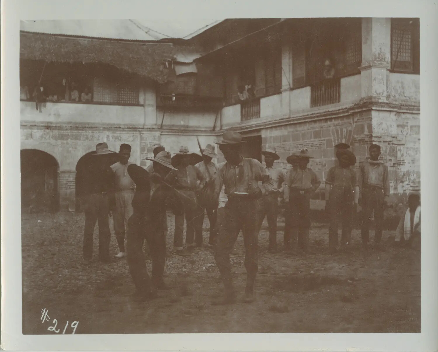 Armed Filipino Scouts or Constabulary Assembled Before Colonial Building, Philippines, Early 1900s