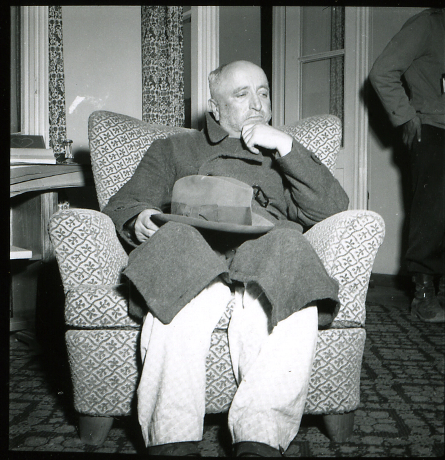 Julius Streicher Seated Under Guard Following His Capture, May 1945