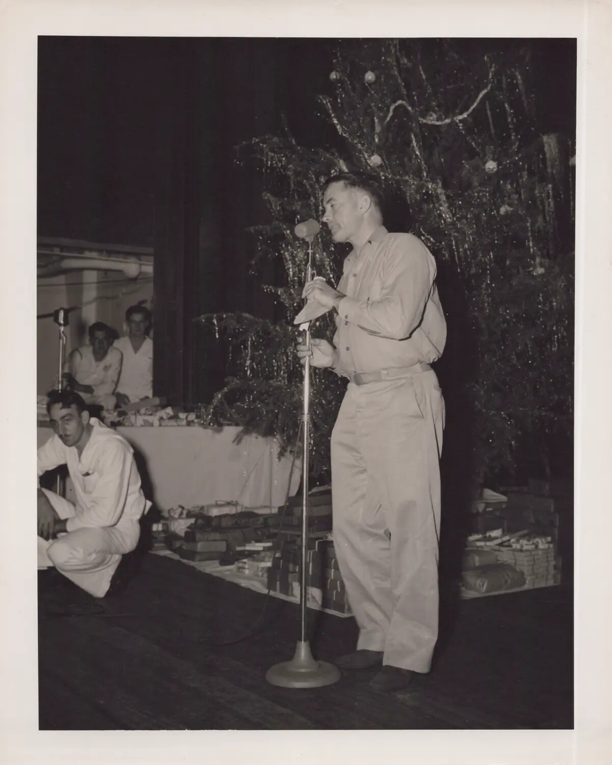 Officer Addressing Crew at Shipboard Christmas Celebration, WWII
