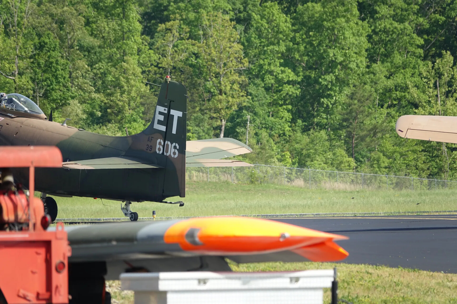 Douglas A-1 Skyraider Tail Code 'ET / AF 39-606' on Airfield Ramp, May 2019 Event (Sequence Frame)
