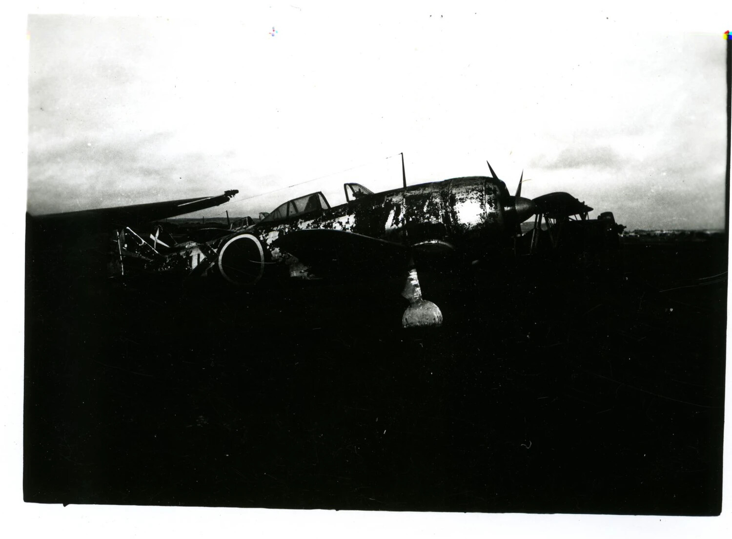 Wreckage of Japanese Fighter Aircraft on Captured Airfield, Burma Theater, WWII