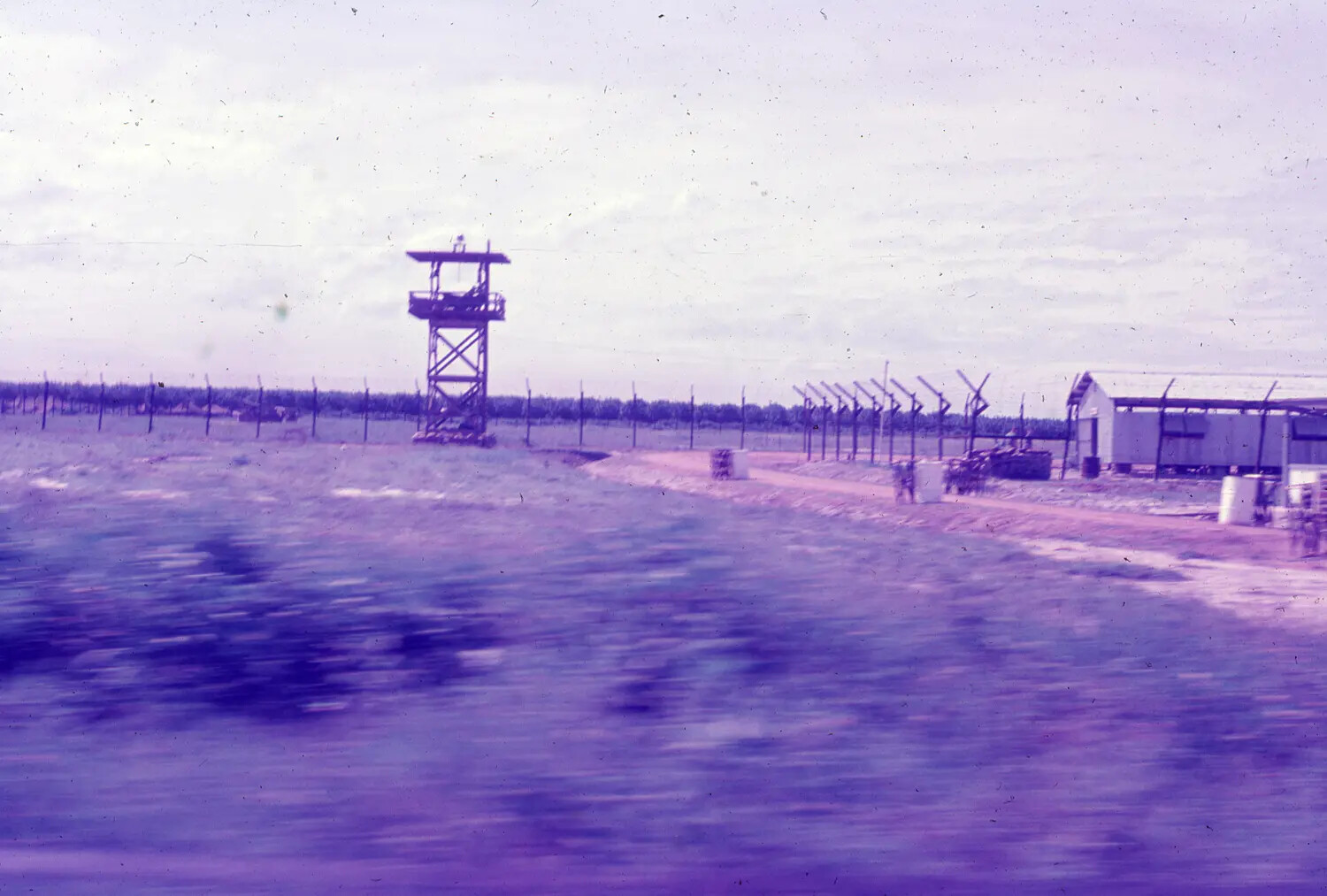 Perimeter Watchtower and Defensive Wire, U.S. Air Base, South Vietnam, 1965 (3rd Tactical Fighter Wing)