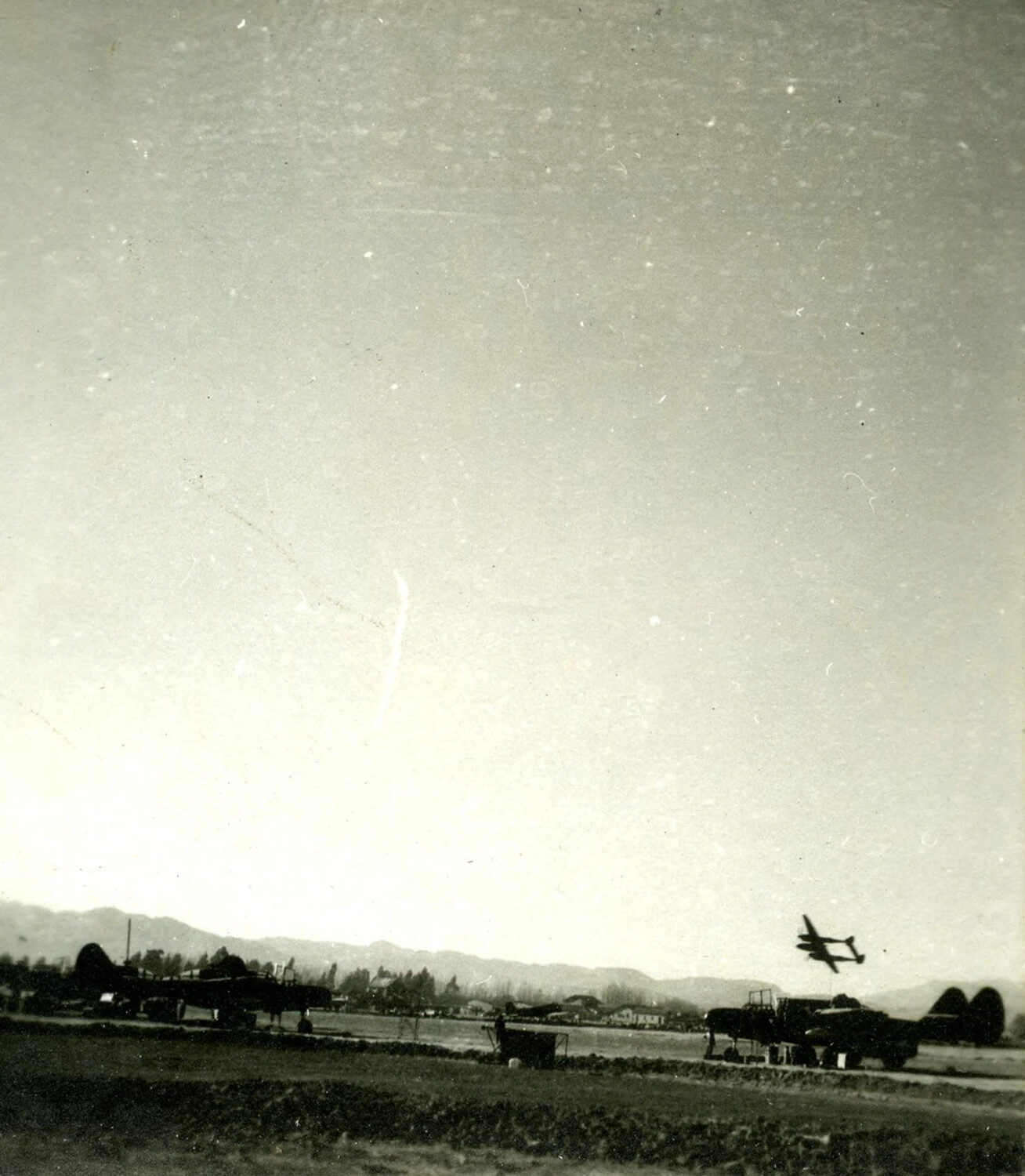 Twin-Engine Aircraft Banking After Takeoff, Airfield Scene, Burma/CBI Theater Collection