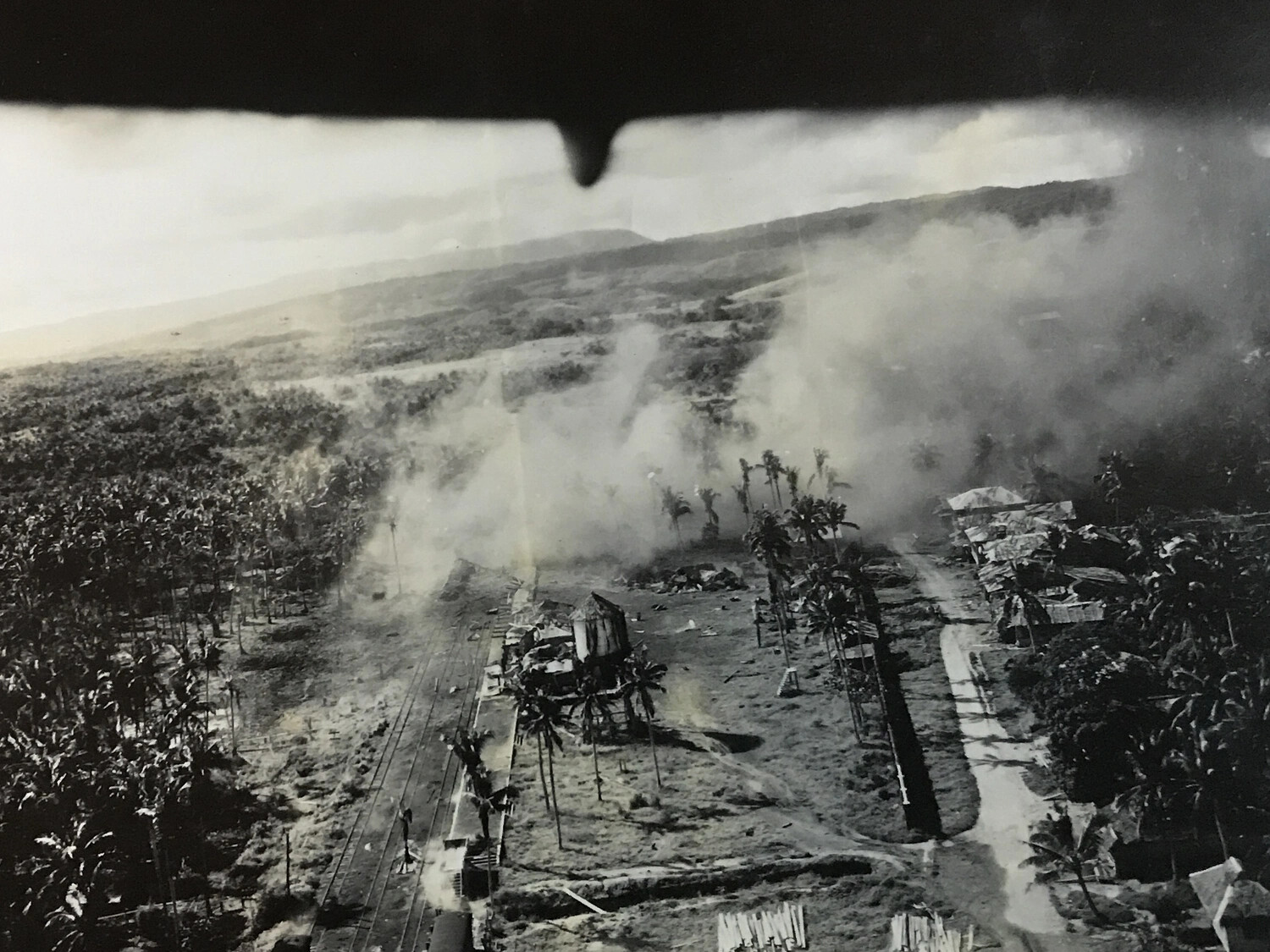 Village and Rail Line Engulfed in Smoke During Air Attack, Sequential Strike Frame