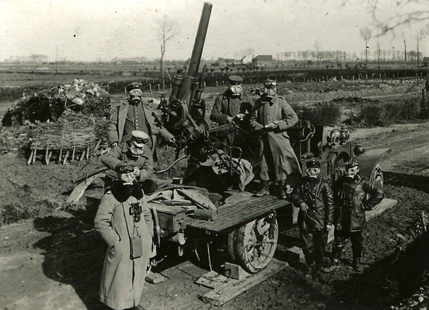 German Artillery Crew Wearing Gas Masks at Field Gun, World War I