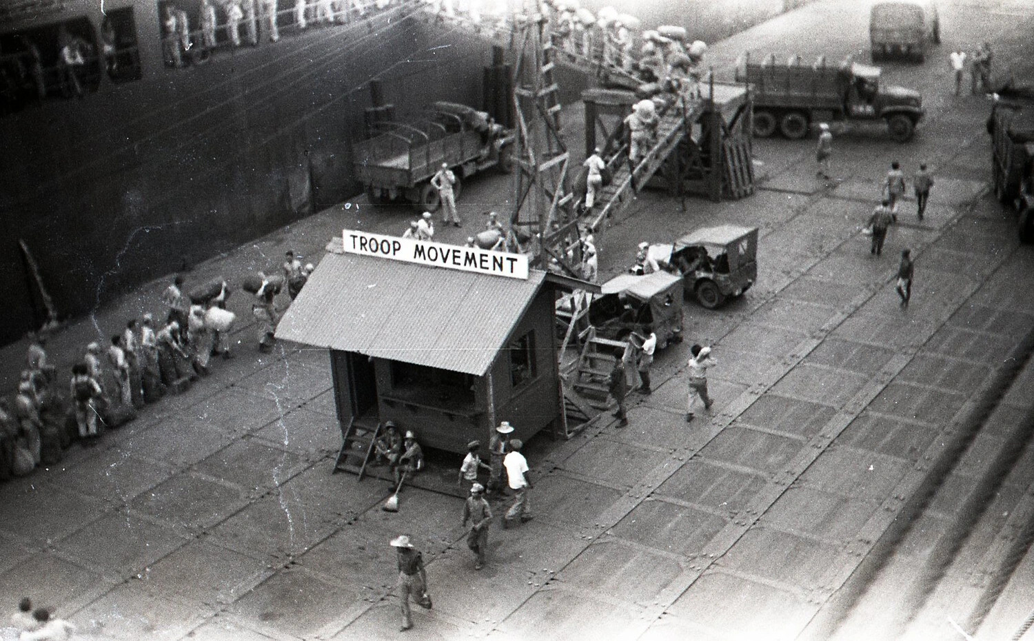 "Troop Movement" — Disembarkation at a Philippine Pier, WWII