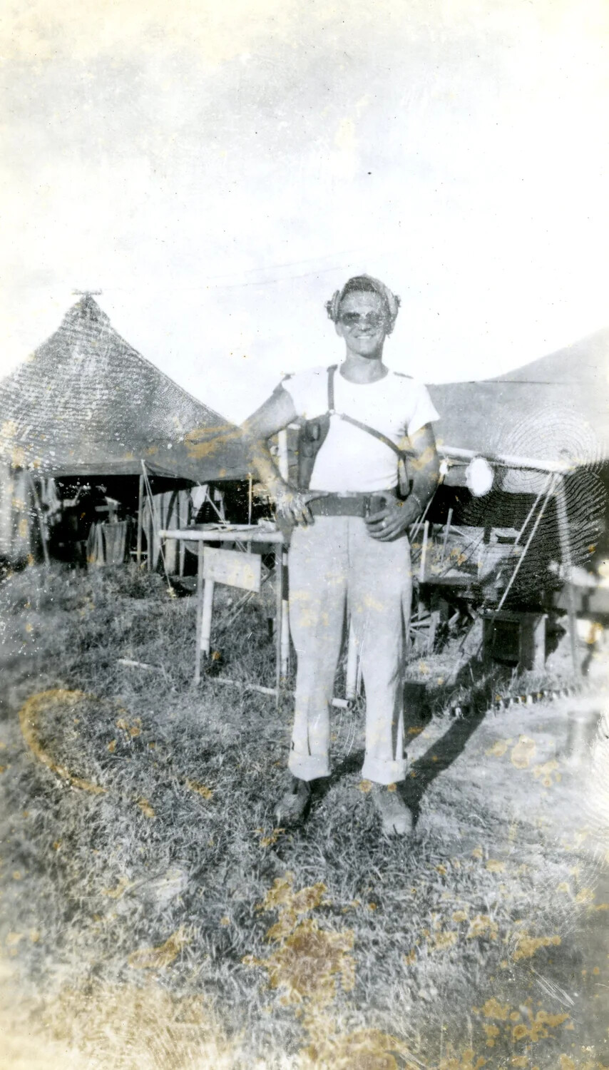 USAAF Airman with Shoulder Holster Harness at Tent Encampment, Pacific Theater, WWII