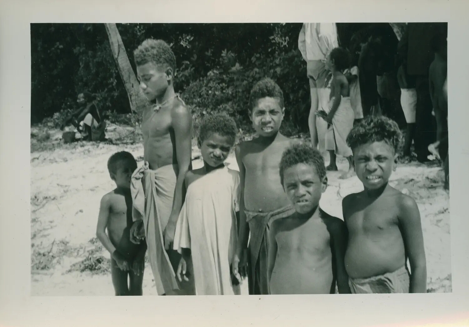 Group of Pacific Islander Boys on a Beach, USS Petrof Bay (CVE-80) Collection, WWII Era