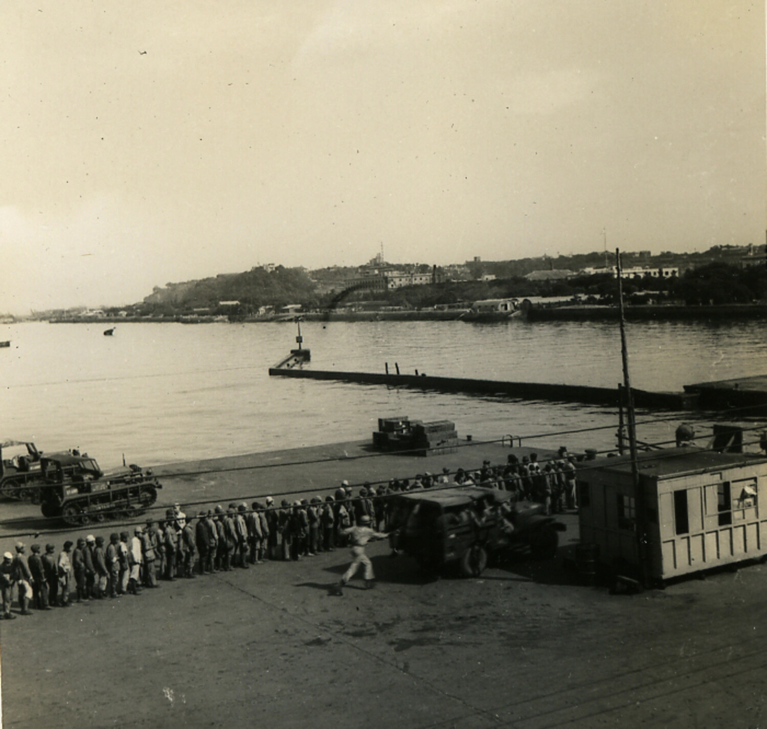 Harbor Scene with Queued Workers and Military Half-Tracks, Postwar Japan