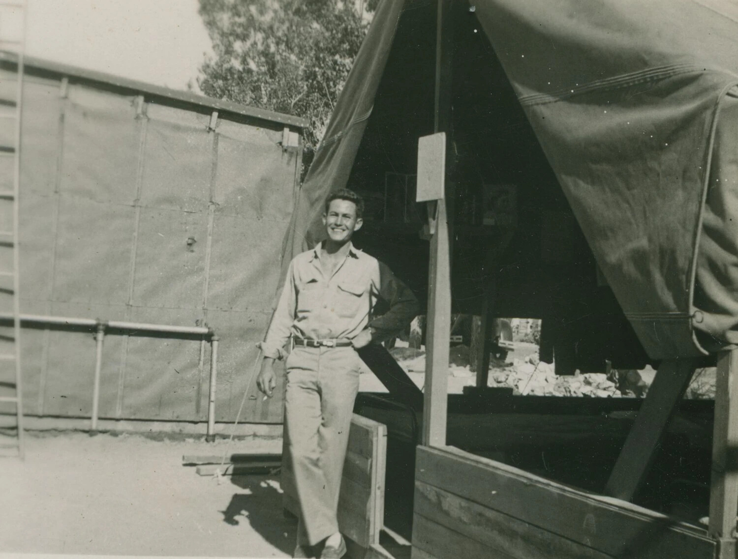 Serviceman Posing at Tent Camp, Pat McAleer Photo Album
